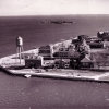 <p>Aerial view of the Hospital Area, looking east, November 1961. Along the shoreline from the left are the Water Tower (Building 45), a multi-family NCO Quarters (Building 44), and the Hospital Sergeants&#39; Quarters (Building 43).</p>